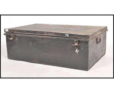 A 19th century military metal trunk of large rectangular form. Handles to the sides with hinged top having notation for JR Co