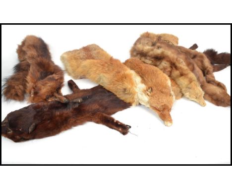 A group of vintage 20th century retro clothing fashion ladies fur stoles to include mink, stoat, fox etc.