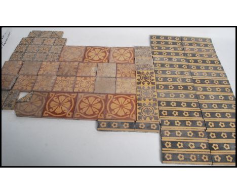 A large collection of 19th century Victorian ceramic tiles approx 8ft by 6ft in total size. Most tiles having geometric desig