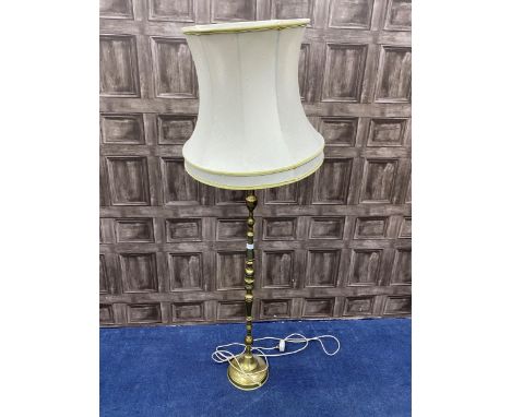 BRASS STANDARD LAMP, with a cream shade