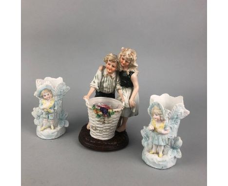 HAND PAINTED FIGURE GROUP, of a couple holdng a basket, 17cm high, along with other ceramic figures (12)