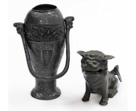 A bronze temple dog, with mouth open, raised on front paws, 14cm high, a vase of tapering circular form, with emblem to the c