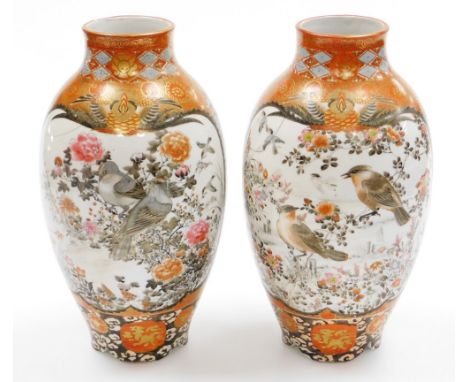 A pair of Japanese Kutani vases, of ovoid form decorated with panels of birds and flowers, predominantly in orange with an or