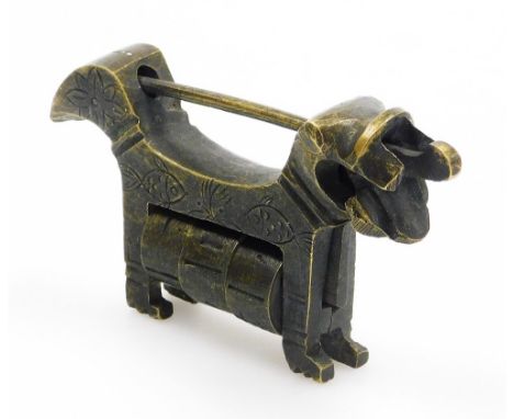 A late 19thC Chinese bronze dragon lock, with three wheel design and pull out lock, 9cm wide. 