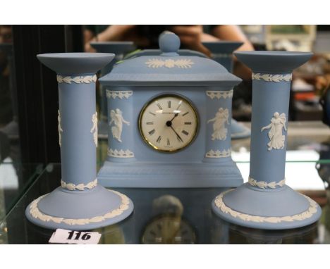 Pale Blue Wedgwood Jasperware Mantel clock and a pair of Candlesticks 
