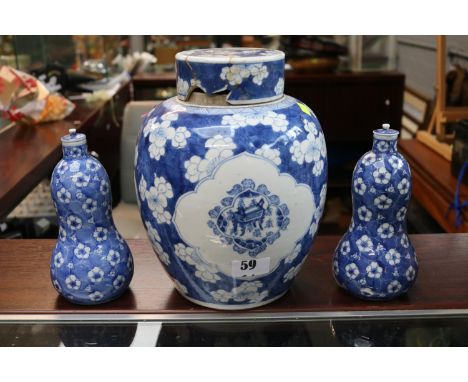 Chinese Blue &amp; White Kangxi porcelain lidded ovoid jar and a Pair of Bombe Blue and white lidded vases. 26cm in Height 