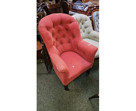 Victorian Reupholstered Button back Elbow chair on carved and turned legs and casters 