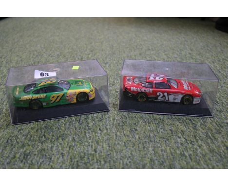 2 Boxed Scalextric Electric Model Cars to include Nascar John Deere 97 Ford Taurus, Nascar Motorcraft 21 Ford Taurus