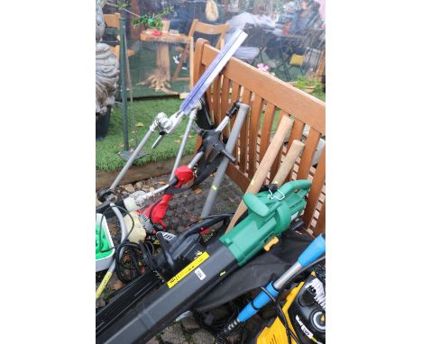 Petrol Multi tool with Chainsaw, Strimmer, Hedge Cutter and a collection of Garden tools