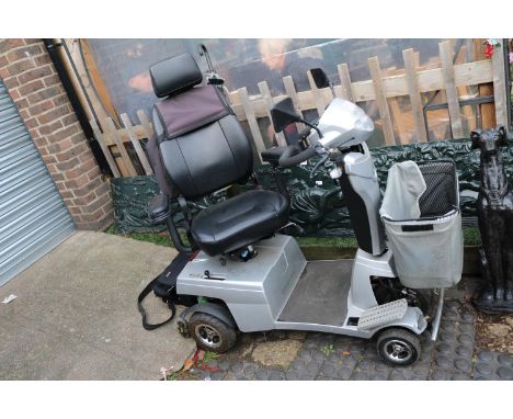 Upright Grey Mobility Scooter with charger and Keys 