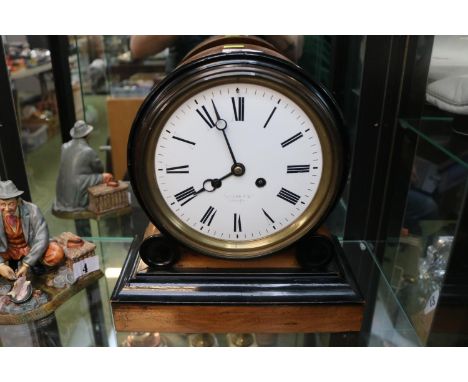 Nathan &amp; Co of Birmingham Pillar clock with roman numeral dial in Walnut case 