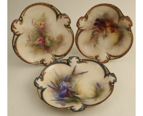 Two Hadley's Worcester shaped plates, together with a Royal Worcester plate, two decorated with flowers, the other with berri