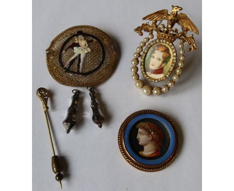 A Victorian circular enamel brooch, decorated with a portrait, set with a gem stone, diameter 1.5ins, together with a stick p