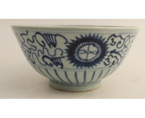 A Chinese Export bowl, decorated in blue and white with a sun and scroll design, seal mark to base, diameter 7.5ins, height 4