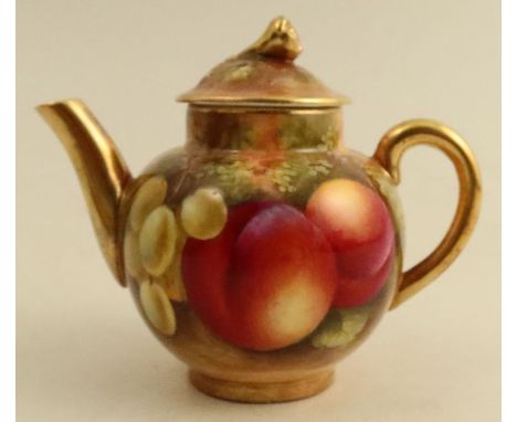 A Royal Worcester miniature teapot, decorated all round with fruit to a mossy background by E Townsend, height 3.5ins - very 