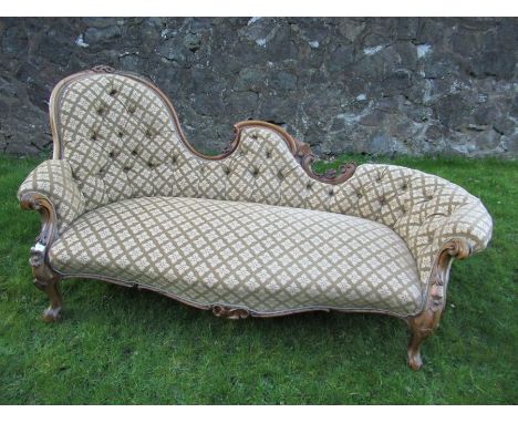 A Victorian chaise longue, with shaped button back