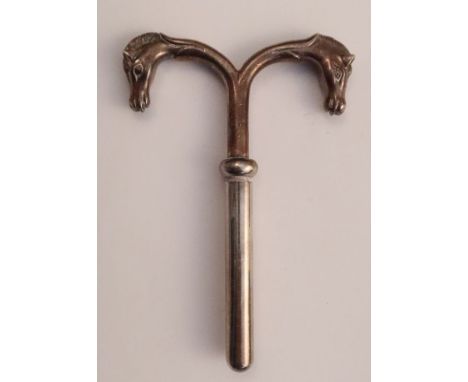 A Hermes silver plated corkscrew, with double horses head, stamped, together with a continental silver snuff box, with gilt i