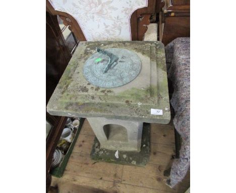 A sectional&nbsp; stone sundial, with case brass scale and gnomon, width 18ins, height 28ins&nbsp;&nbsp;There are some holes&