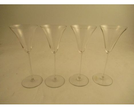 A set of 4 Lalique clear glass slender stem wine glasses , inscribed R Lalique France to the base