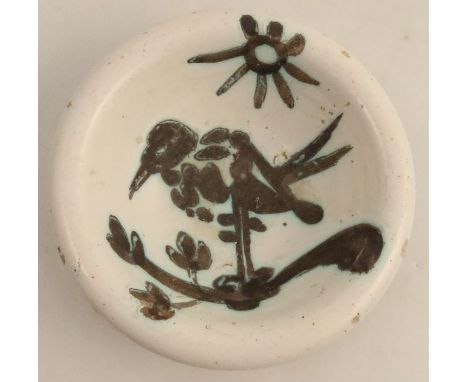 Pablo Picasso, a Madoura pottery bowl, decorated with a bird under the sun, painted and impressed marks to base, diameter 6in