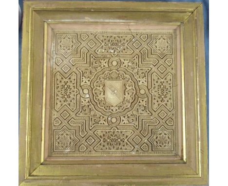 An Antique Islamic terracotta tile, decorated with a shield to the center and a geometric pattern, 10.5ins x 10.5ins