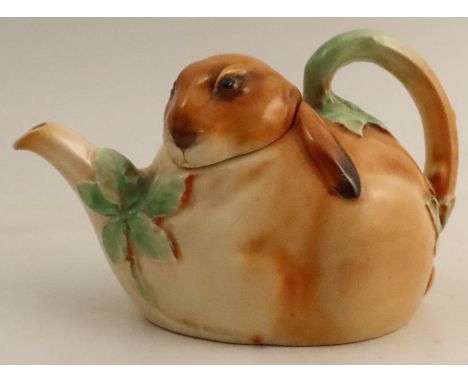 A Royal Doulton Bunnykins novelty teapot, formed as a rabbit head and leaves - The teapot has some staining to the interior a