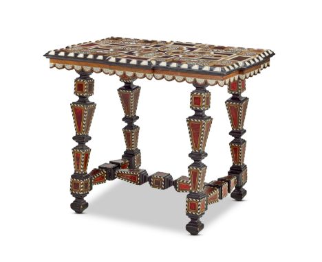 A Spanish late 19th century tortoiseshell, rosewood, engraved ivory, ebony, bone and chequered inlaid centre tablein the late