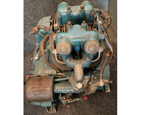 A stationary generator,for domestic use, comprising Triumph motorcycle engine parts, BTH magneto and manifolds, 56 x 47 x 47c