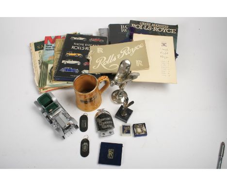 Assorted Rolls-Royce and Bentley automobilia,including a replica Phantom I mascot on a radiator cap; three miniature Rolls-Ro