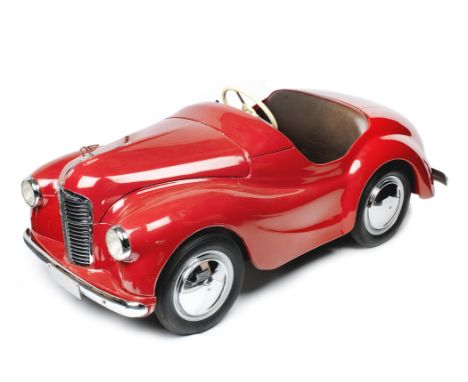 An Austin J40 pedal car, British, 1960s,chassis number 14622, finished in original Tartan Red livery with brown upholstery, c