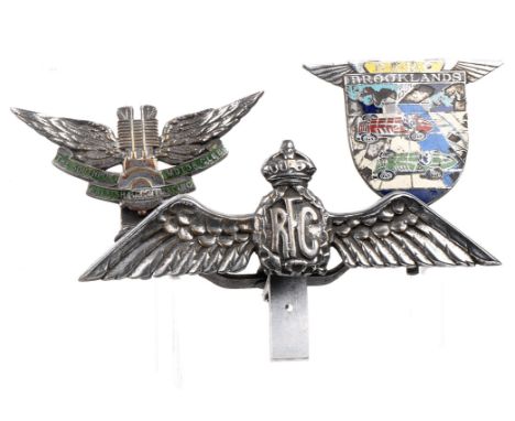 A custom-made badge bar fitted with two badges and a mascot,comprising badges for BARC Brooklands, 1930s, number 335 by Spenc