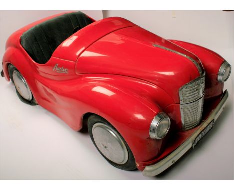 An Austin J40 pedal car for restoration,chassis number 8021, has majority of components including headlamps, bonnet, boot, st