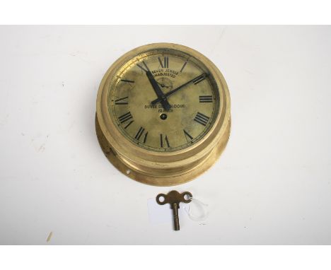 A brass bulkhead clock by Duver Drey Bloquel of France,with brass dial with black Roman numerals and subsidiary seconds dial,