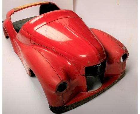 An Austin J40 pedal car for restoration,chassis number unreadable, dismantled, with majority of component parts including fro