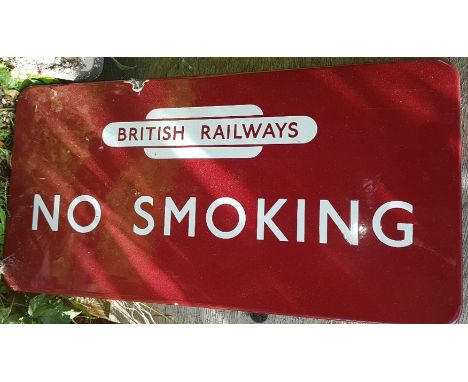 A British Railways 'No Smoking' enamel sign,Midland Region, in white on maroon, 30 x 60cm, with a chip to top with enamel los