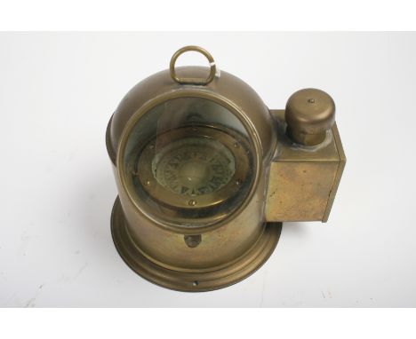 A binnacle compass and two ship's logs,the brass binnacle by C.Plath of Hamburg, 17cm high, together with two brass ship's lo