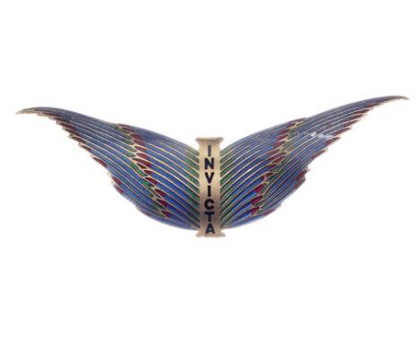 An Invicta enamelled radiator badge, 1930s,curved brass badge, in the form of the winged emblem, in blue, red and green ename