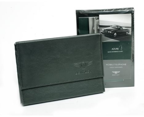 A Bentley Azure full handbook set,second series, comprising a black leather bound handbook, with three quick reference guides