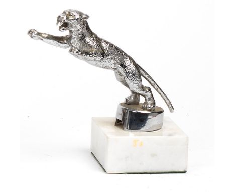 A 'Leaping Jaguar' mascot by Desmo, post-War type,chrome plated, 19cm long, on a Desmo stamped stand, above a marble display 