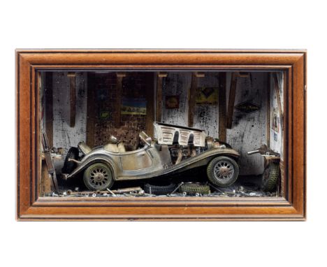 A Mercedes-Benz 500K garage diorama by Classic Car Art Ltd,scale diorama in a Box-Art shadow-box glazed display, depicting th