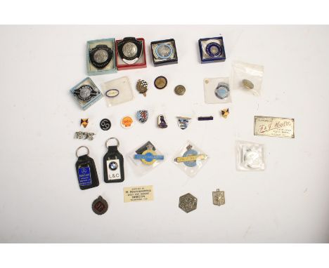 Assorted lapel badges and dealer's St.Christopher plaques,lapels including TT Ulster 1934, Wolseley, VCC, BARC, Goodyear, Bea