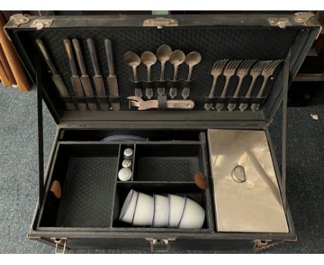 A five person picnic set,black Rexine covered dome toped case, opening to cutlery in lid, five enamel cups and plates, two fl