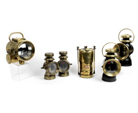 A pair of Lucas No.F146 oil-illuminating sidelamps,brass bodies, spade-mounting, 3-inch clear lenses with ruby-red rear lense