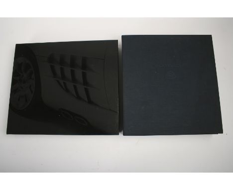 Two motoring books; a Mercedes-Benz SLR McLaren Owners book, and Jurgen Lewandowski: The New Maybach/Road to a Legend;each 1s