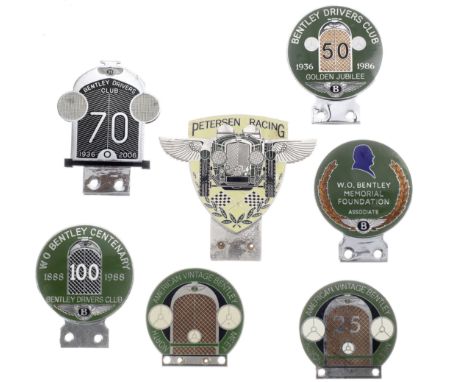 Seven Bentley related car badges,six enamel, comprising Petersen Racing, Bentley Drivers Club W.O. Bentley Centenary 1998, Be