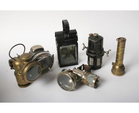 Assorted vintage lamps and a torch,comprising a Powell &amp; Hanmer acetylene motorcycle lamp, numbered '120', nickelled brig