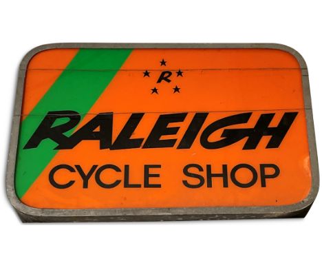 A Raleigh cycle shop illuminated double sided sign,alloy frame with orange, green and black panels, 60 x 87cm, with bracket. 