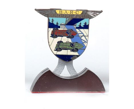 A BARC Brooklands enamel badge by Spencer of London, British 1930s,chromed plated badge with 8-colour enamelled design of two