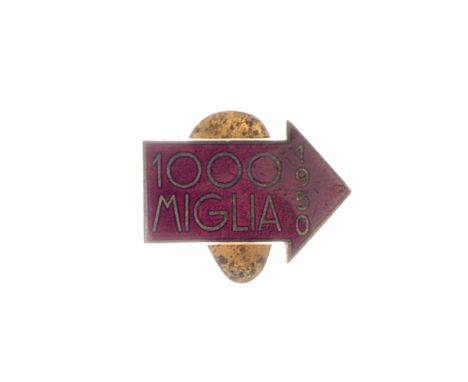 A 1950 Mille Miglia competitor's lapel badge by S.Johnson of Milan,brass arrow shaped badge with red enamel decoration, (1mm 
