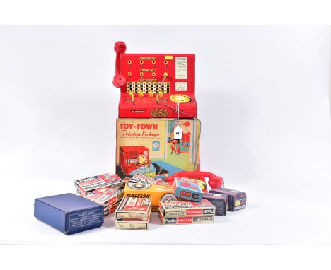 A BOXED CODEG TOY-TOWN TELEPHONE EXCHANGE, of tinplate and plastic construction, exchange unit is missing cradle for handset 